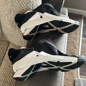 Nike Women’s Black and White Slip-On Athletic Sneakers